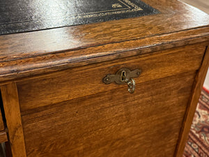 Antique Desk (partner desk) 410 - Classic English desk, Dark blue leather, Brass handles, light oak wood, ca. 1920s